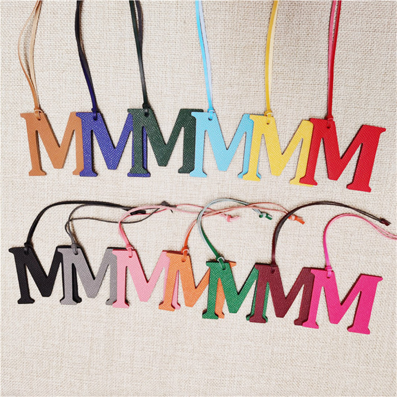 XMESSUN New English Letters M  - Monogram Keychain Leather review and price