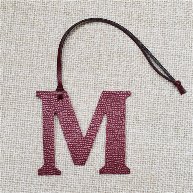 XMESSUN New English Letters M  - Monogram Keychain Leather review and price