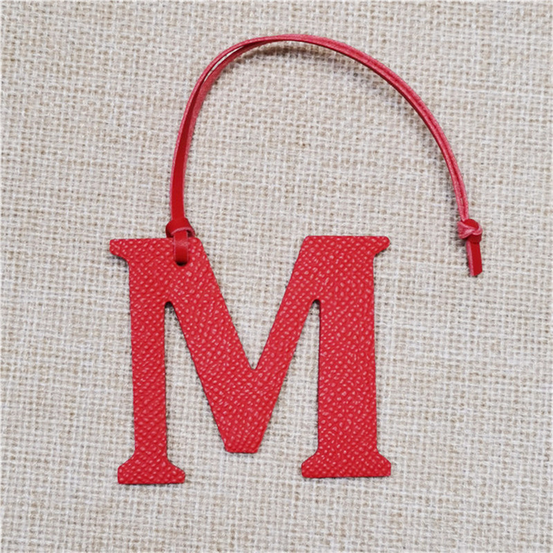 XMESSUN New English Letters M  - Monogram Keychain Leather review and price